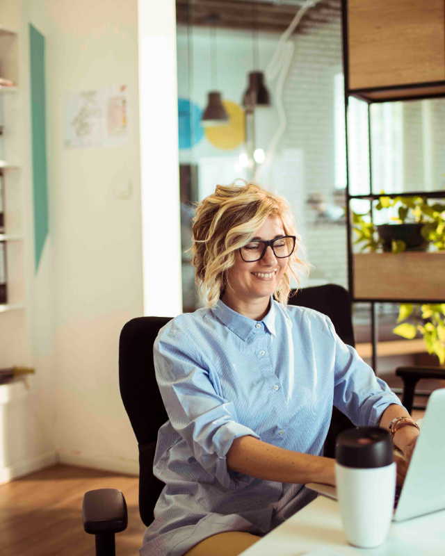 Advisor working at a bright office desk